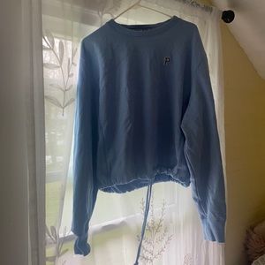 Large Pink drawstring sweatshirt.